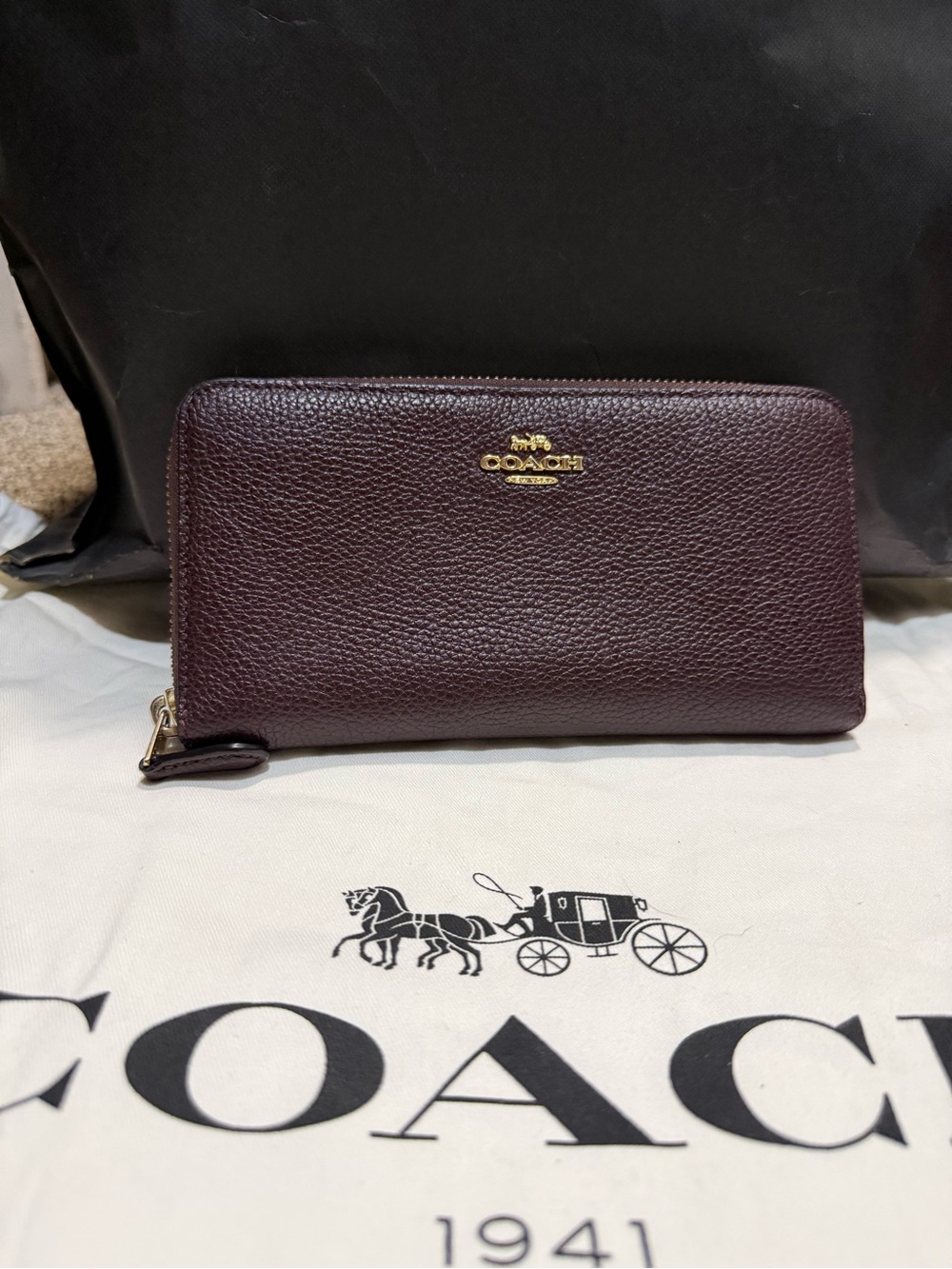 Coach Pebbled Zip Wallet in Deep Burgundy with Gold Logo